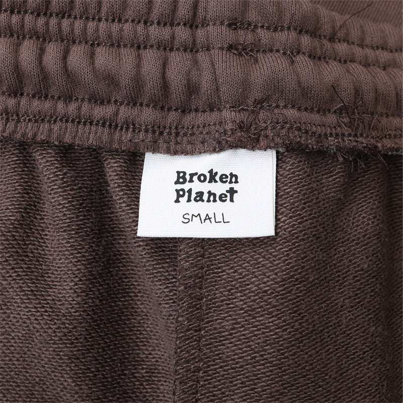 Calça Moletom Broken Planet Logo Writing Brown